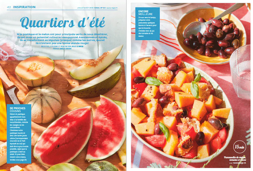 Plateau de fruits d'été avec pastèque, melon, salade de fruits et olives.